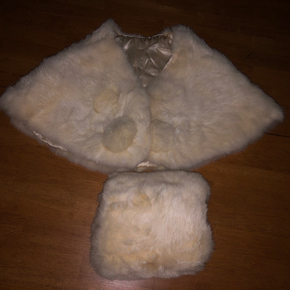 Young lady’s fur with muff to match. It was mine as a child, it’s 50 years old.